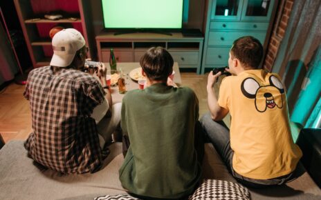 Friends Playing Video Game at Home